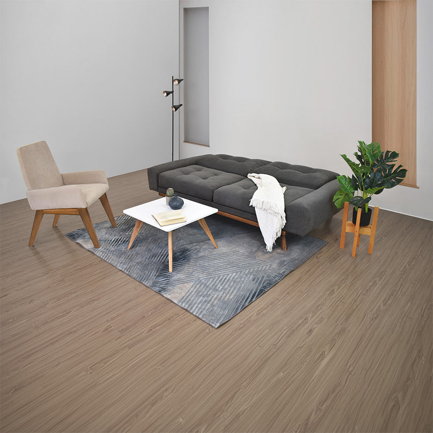 Sala suiza con poltrona islandia tela gris taupe